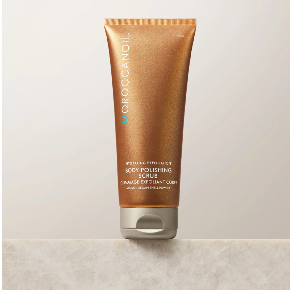Скраб за тяло с аромат на магнолия и кехлибар Moroccanoil Body Polishing Scrub 200ml